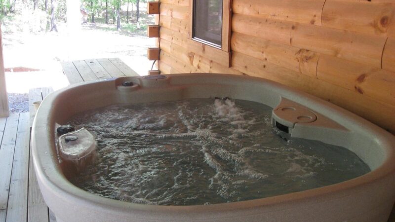Country Charm Log Cabins, cabin with a private hot tub, photo 1