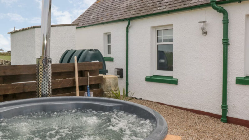 THE DAIRY COTTAGE, cabin with a private hot tub, photo 1