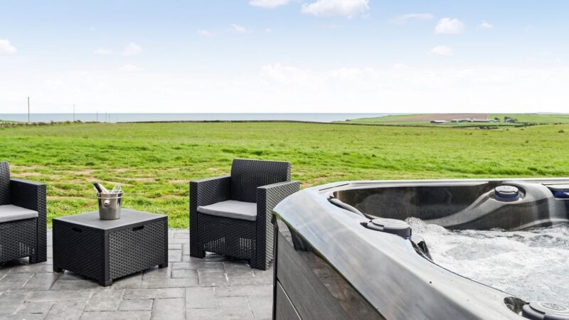 The Seaview Snug, cabin with a private hot tub, photo 1