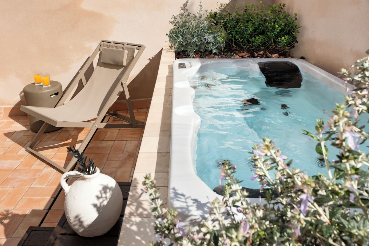 Magno Apartments Clavellinas, habitación con jacuzzi privado