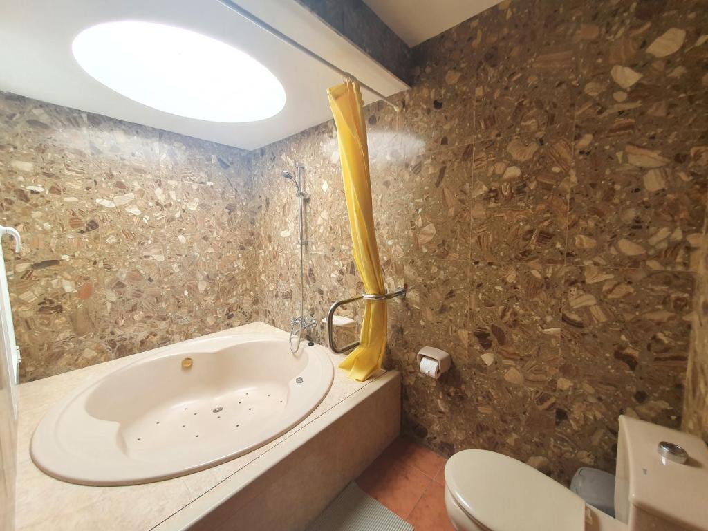 Island Village, habitación con jacuzzi privado