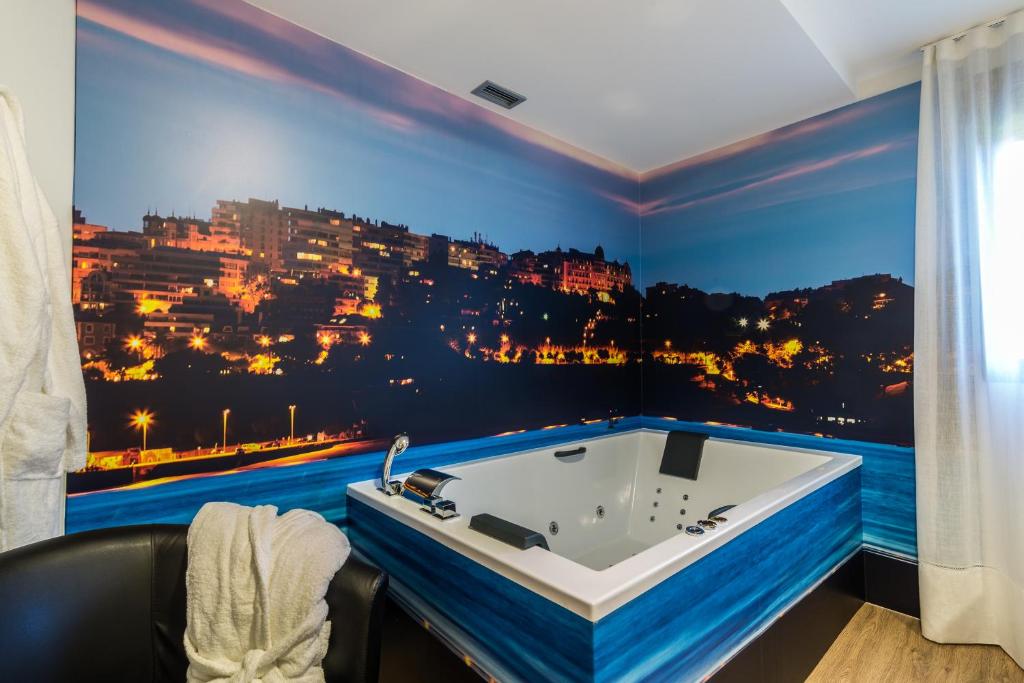 Suite Home Sardinero, habitación con jacuzzi privado