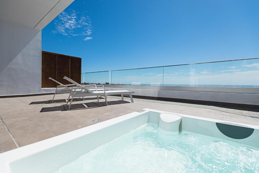 Altos De La Gloria Beach Apartments, habitación con jacuzzi privado