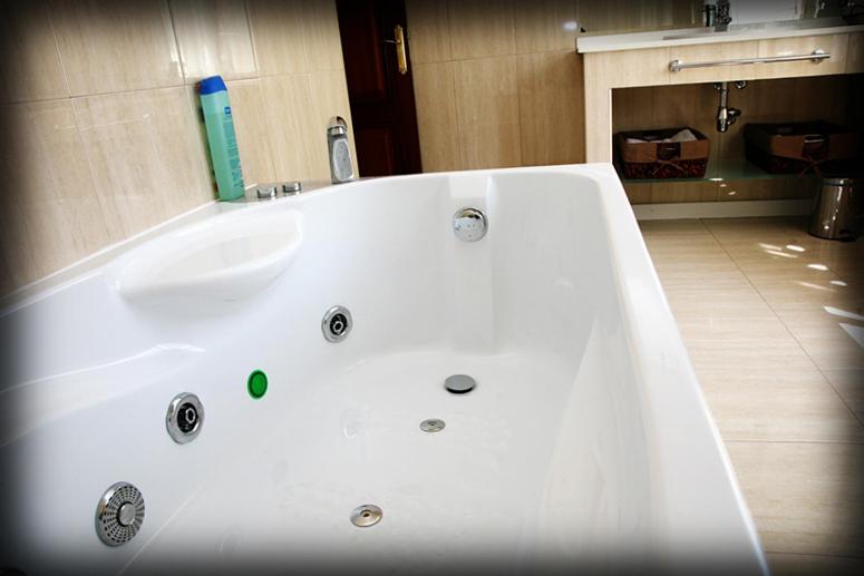 Casa Lourido, habitación con jacuzzi privado