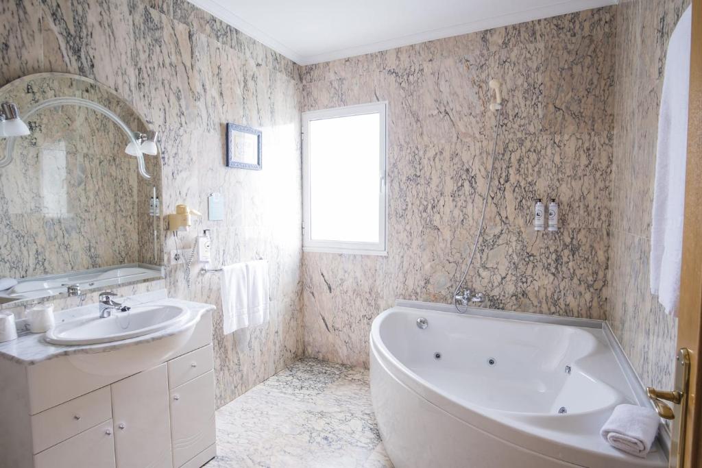 Hotel Alpina, habitación con jacuzzi privado