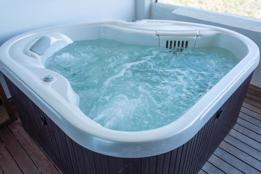 Carvajal Luxury Apartments, habitación con jacuzzi privado
