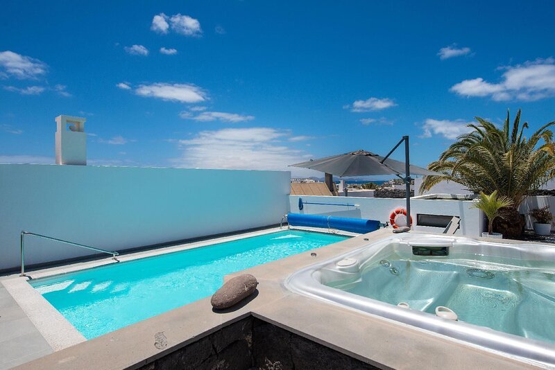 Holiday House Playa Blanca, habitación con jacuzzi privado