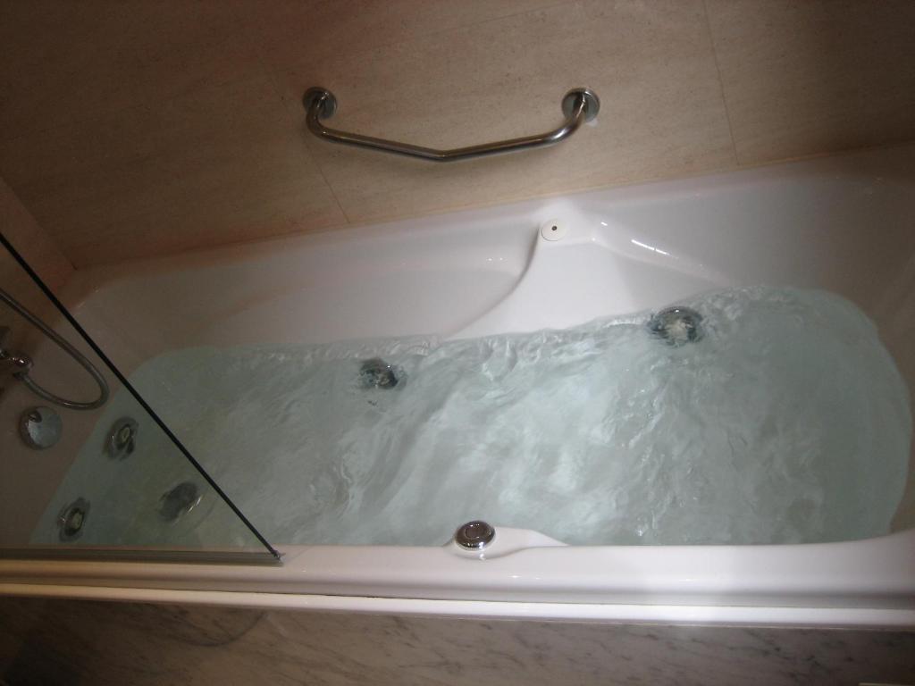 Hotel Santiago, habitación con jacuzzi privado