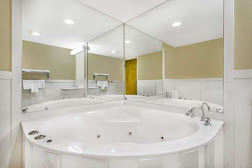 Super 8 by Wyndham Bentonville: the Studio Suite with 1 King Bed and Hot Tub in Bentonville, AR