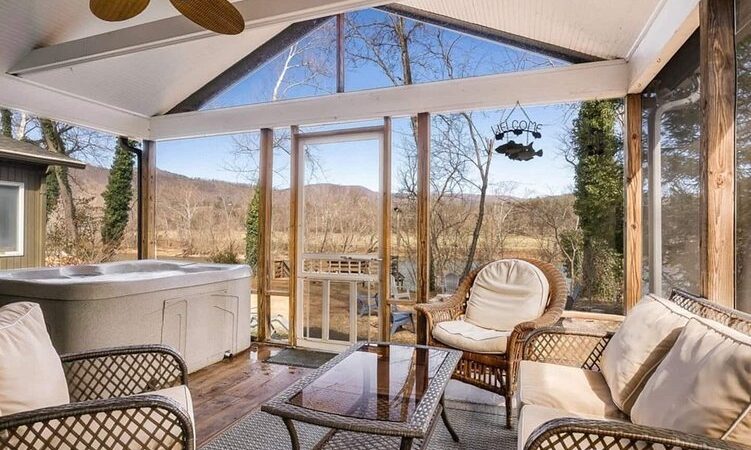 Riverfront Home, cabin with a private hot tub