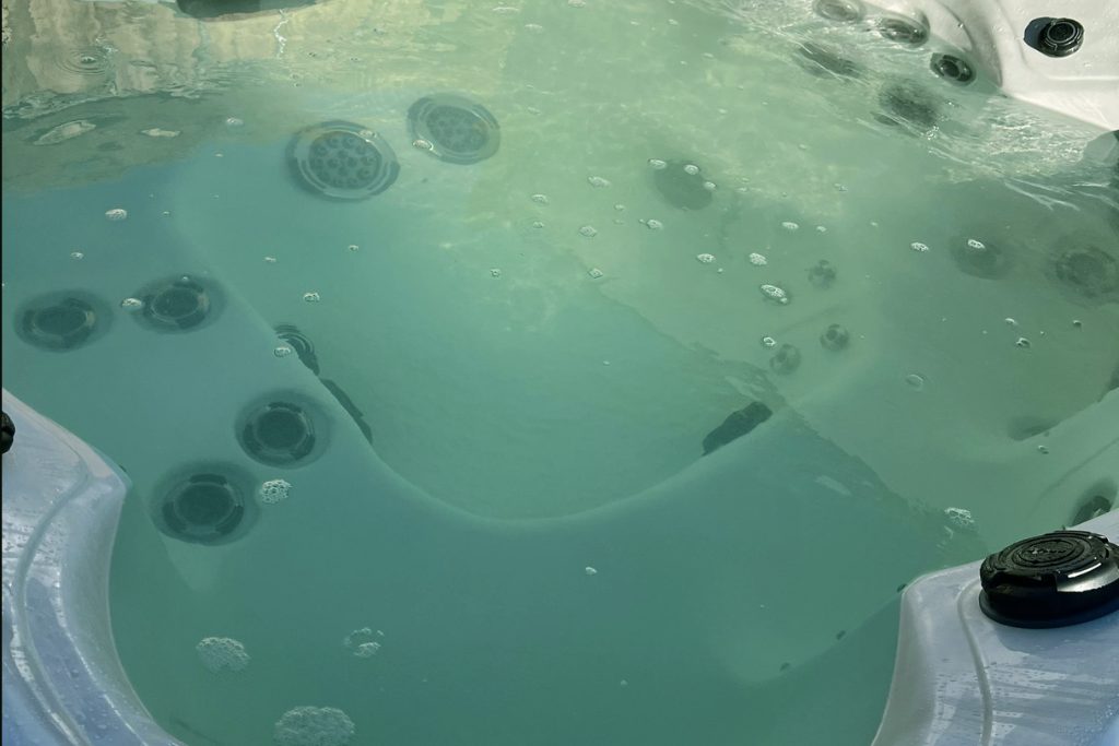 Green Water Green cloudy hot tub water caused by poor water balance