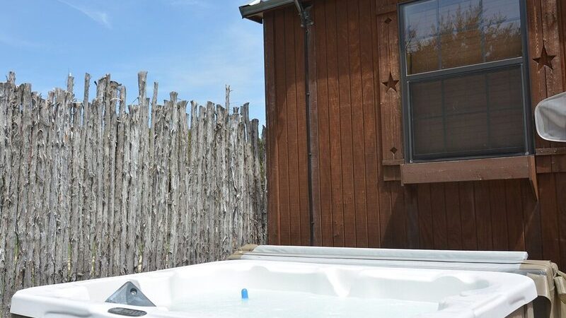 The Smokehouse, cabin with a private hot tub, photo 1