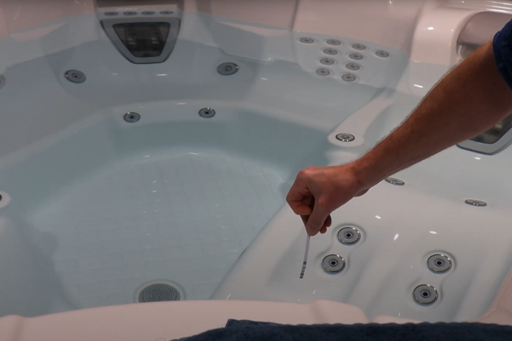 dipping color-changing strips in hot tub water