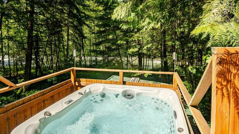 The River House, cabin with a private hot tub, photo 1